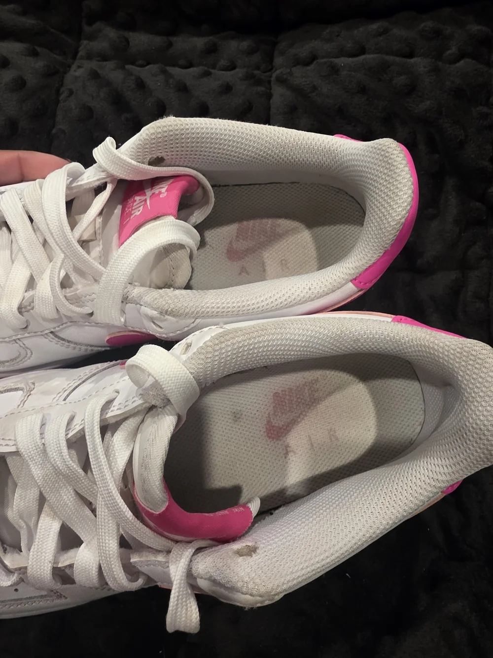 Nike Air Force 1 White Low-Top with Bright Pink Swoosh and Outsole.